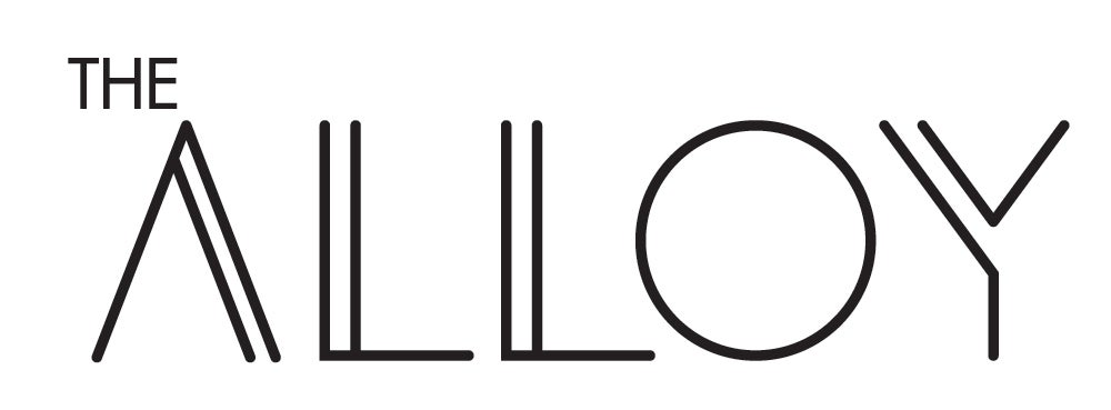 Black‑outlined text logo saying “THE ALLOY” on a white background.